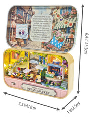 DIY Miniature Dream Market tin box diorama with lMarket-themed fairy tale castle scene.  Picture also shows the size of the tin 6.4 in byy 5.5 in on a white background.