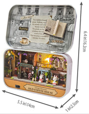 A charming vintage café village with the Old Coffee House DIY Tiniature Kit. Measurements of the project are included (6.4" high by 5.5" wide).