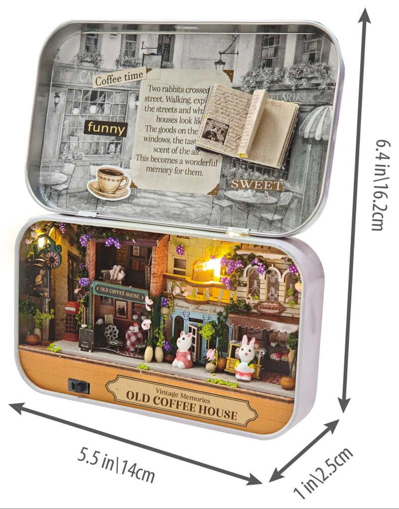 A charming vintage café village with the Old Coffee House DIY Tiniature Kit. Measurements of the project are included (6.4" high by 5.5" wide).