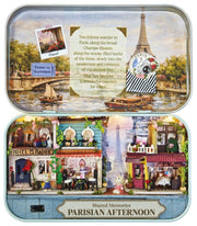 A charming Paris-inspired miniature with the Parisian Afternoon DIY Tiniature Kit on a white background.