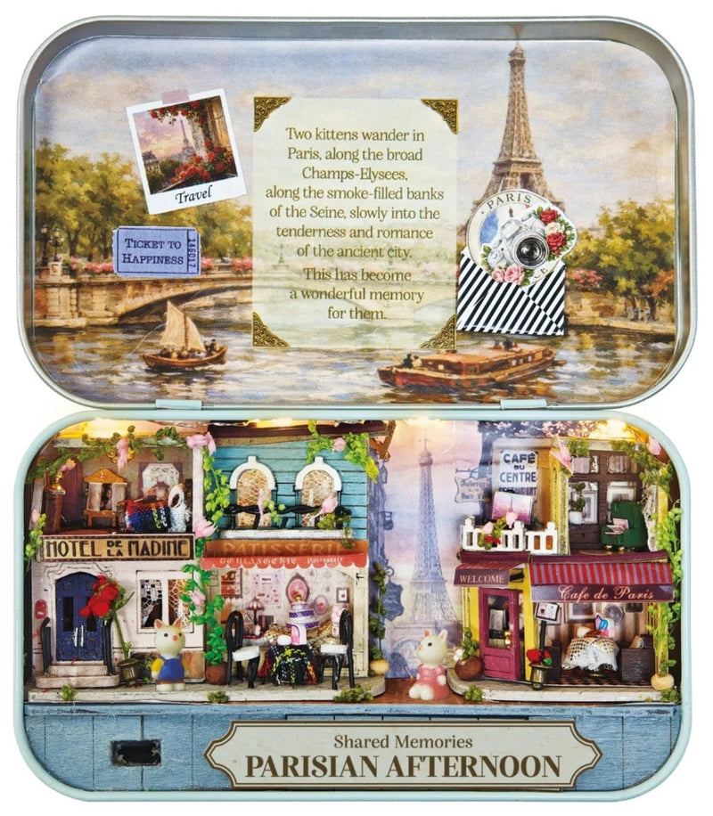 A charming Paris-inspired miniature with the Parisian Afternoon DIY Tiniature Kit on a white background.