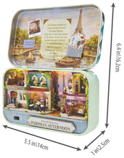 A charming Paris-inspired miniature with the Parisian Afternoon DIY Tiniature Kit on a white background. The picture also shows measurements of the finished kit of 5.5" wide and 6.4" high.  