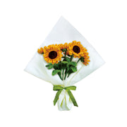Completed chenille sunflower bouquet wrapped in white paper with green ribbon
