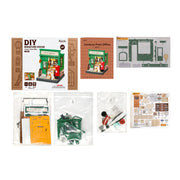 DIY Miniature House Century Post Office kit with components and instruction sheets displayed
