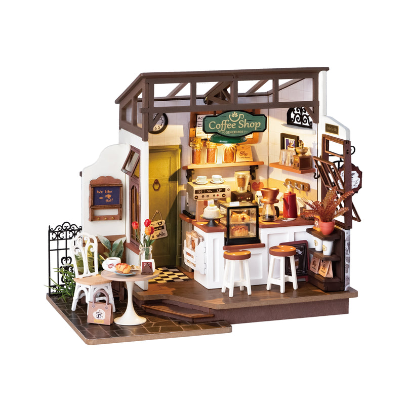 Miniature coffee shop dollhouse kit with detailed interior furniture and accessories