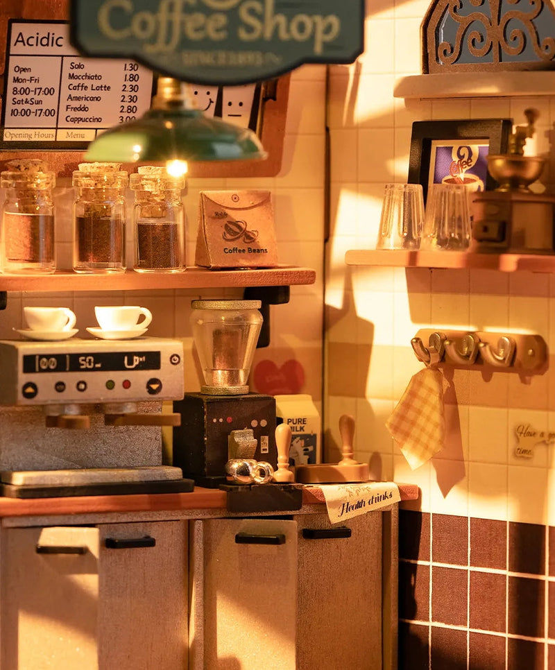 Miniature coffee shop dollhouse with espresso machine, menu, and detailed cafe accessories