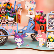 Colorful flower cart diorama with cute cartoon characters and floral decorations