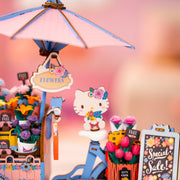 Assembled flower cart miniature with Hello Kitty figure, umbrella, and colorful flower displays