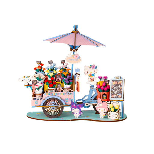 Colorful miniature flower cart model with umbrella, flowers, and cute character figures