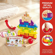 Hape Grow With Me colorful wooden building blocks set with numbers and letters displayed on floor