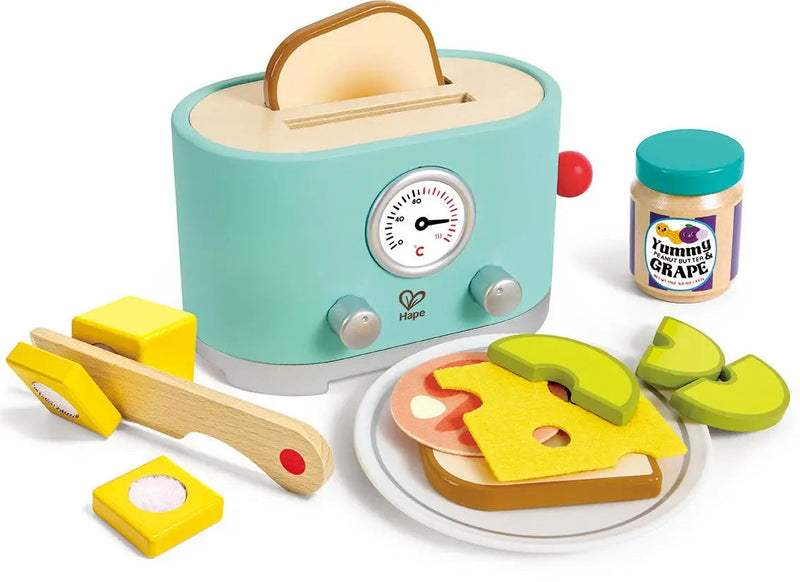 Hape wooden pop-up toaster playset with bread, sandwich toppings, knife, and peanut butter jar