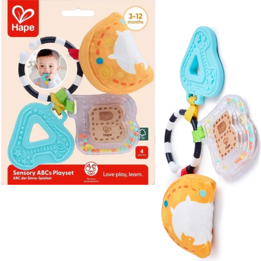 Hape Sensory ABCs Playset and rattle in packaging on a white background.