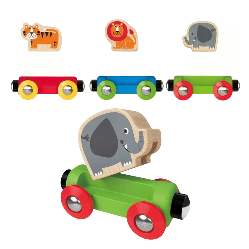 A set of colorful wooden toy trains and animal pieces on a white background. The set includes three small train cars with animal-shaped roofs: a red and yellow tiger train, a blue and green lion train, and a green and red elephant train, plus a larger green train with red wheels and a wooden elephant piece mounted on it.