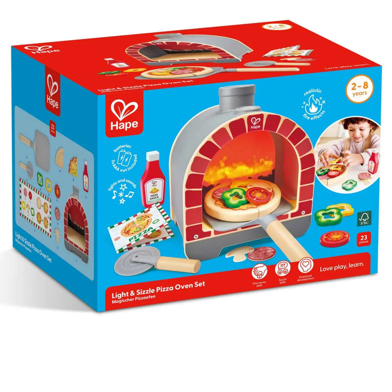 Hape packaging for Light & Sizzle Pizza Oven on white background.  Box shows pretend pizza, veggies, sauce, etc.