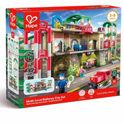 Hape box with all parts & pieces of the Multi-Level Railway City Set on a white background.  Best for ages 3-6 years.