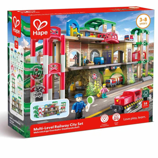 Hape box with all parts & pieces of the Multi-Level Railway City Set on a white background.  Best for ages 3-6 years.