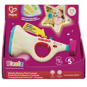 Hape Pixelz Melody Maestro Pixel Trumpet toy in its original retail packaging, featuring a turquoise and light wood toy trumpet with colorful buttons.