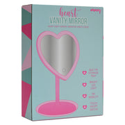 Pink heart-shaped vanity mirror with LED lights in product packaging box