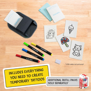 Temporary tattoo kit with markers, ink pads, and tattoo designs on a wooden surface.