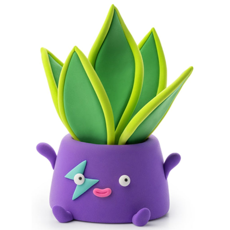 Purple creature-shaped planter with green succulent leaves made out of Hey Clay by Fat Brain on a white background