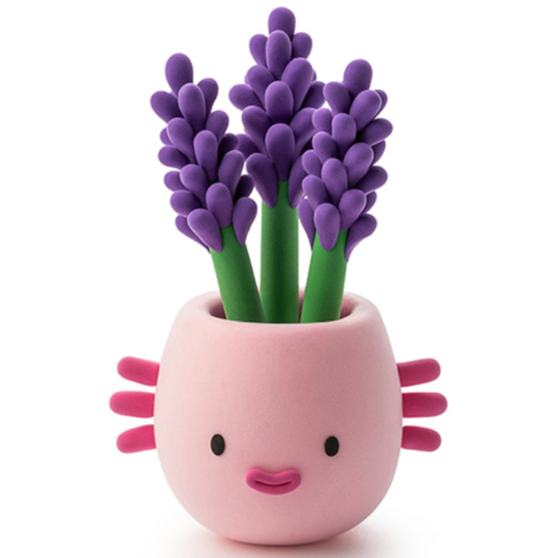 Light pink planter with purple Hyacinth plant made out of Hey Clay from Fat Brain Toys on a white background. 