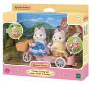 Calico Critters Husky Sister & Brother tandem cycling set in packaging.