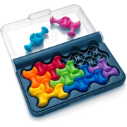 Colorful puzzle pieces in a clear plastic case on a white background