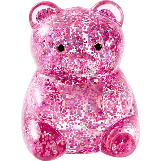 Pink Glitter Bear shaped squishy on white background.