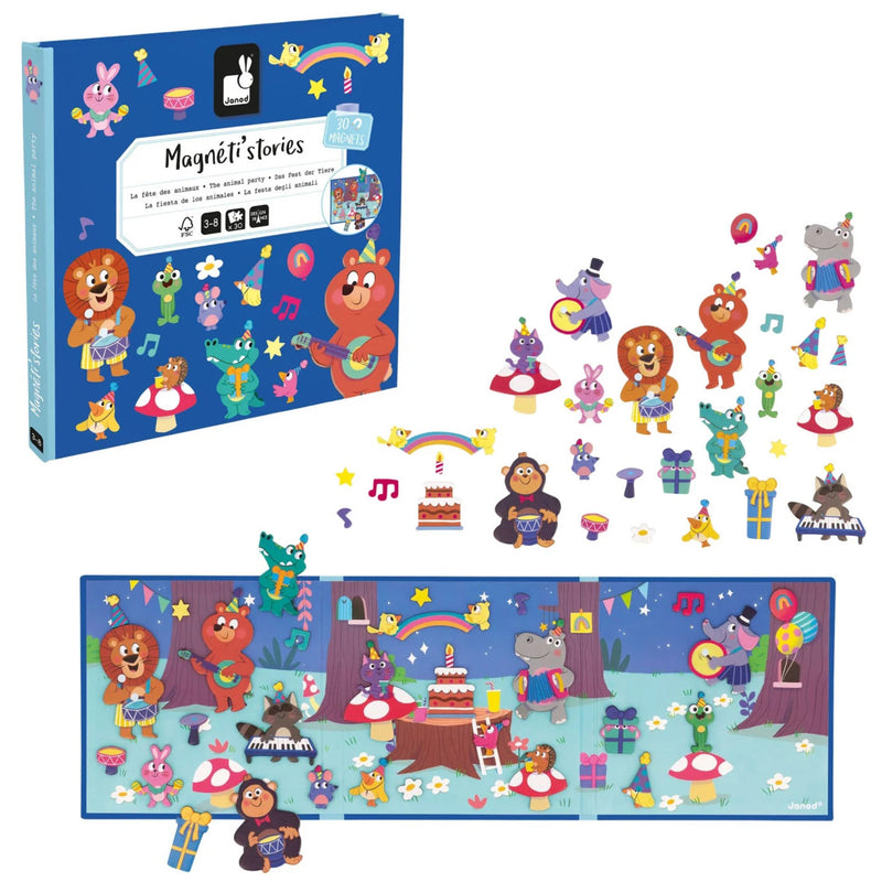 Magnetic storytelling board game set with a blue illustrated box, scattered animal and party-themed magnetic pieces, and a completed story board scene showing bears, a gorilla, flowers, stars, and musical notes.