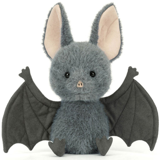 A plush toy bat with soft gray fur, large upright ears, dark wings spread wide, and a small pink nose on a plain white background.