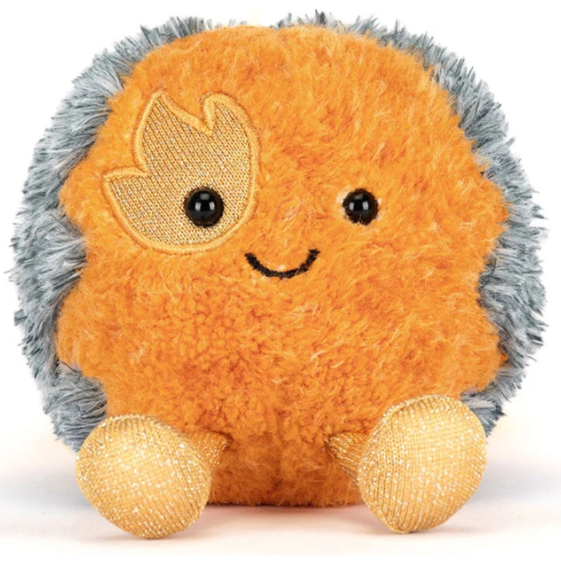 Front face of Jellycat's plush Space Comet.  Orange and gray.  Embroidered flame over left eye on white background.