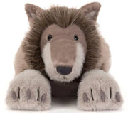 Ulrich Wolf from Jellycat is staring you down with his black eyes and gray fur.  He's got a bit of a mane around his face and is pictured on a white background.