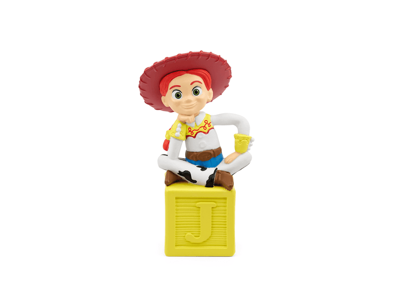 Jessie cowgirl Tonie figure sitting on yellow block with letter J