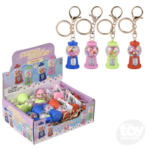 Colorful gumball machine keychain display with blue pink green red variants in retail box