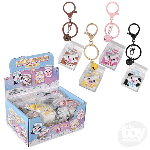 Kawaii milk carton keychains with cute animal faces in display box and individual colors