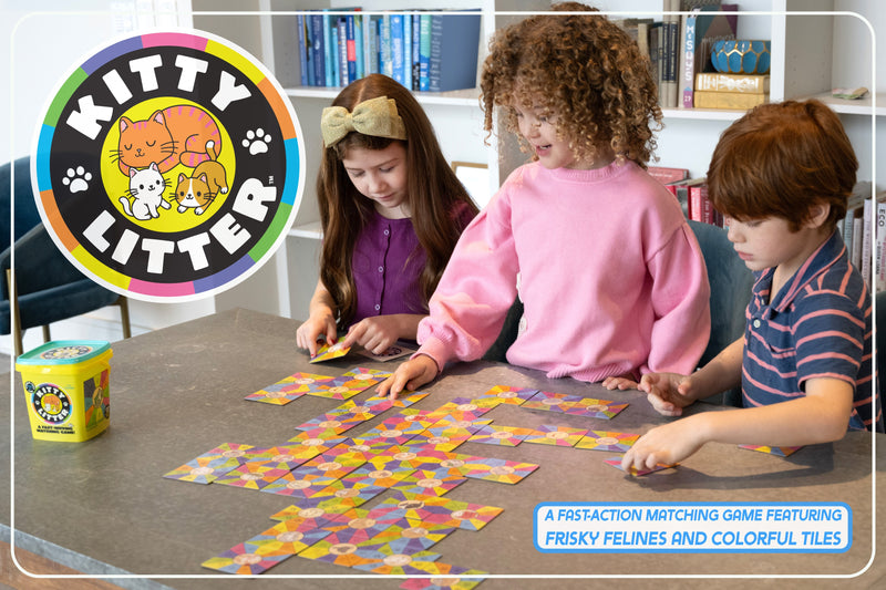 Three children playing Kitty Litter matching game with colorful tiles on table