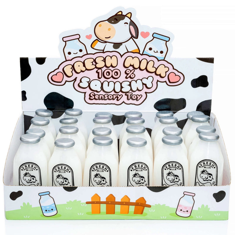 A retail display box filled with small squishy milk bottles labeled 'Fresh Milk 100% Squishy Sensory Toy' on a white background.
