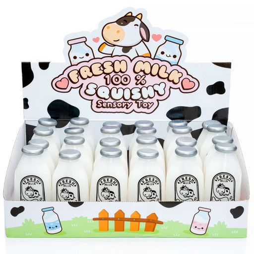 A retail display box filled with small squishy milk bottles labeled 'Fresh Milk 100% Squishy Sensory Toy' on a white background.