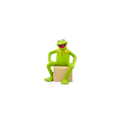 Green Kermit the Frog Tonie figure sitting on wooden block against white background