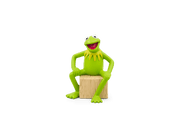 Kermit the Frog Tonie figure sitting on wooden block against green background
