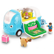 Toy camper van with open back, figures, and a dog on a white background.