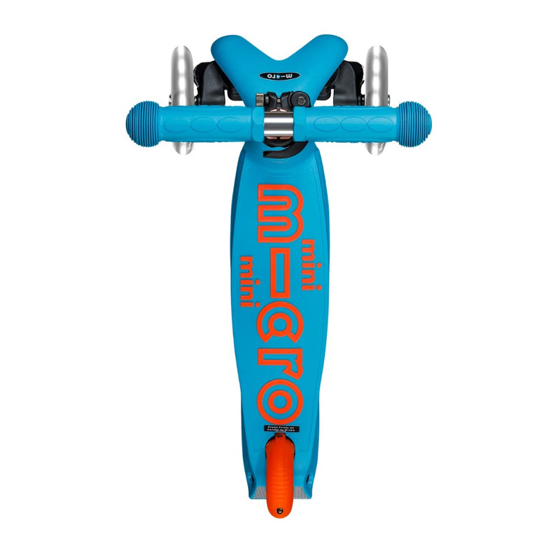 The base plate on a Aqua Blue and Orange Scooter on a whiite background.  