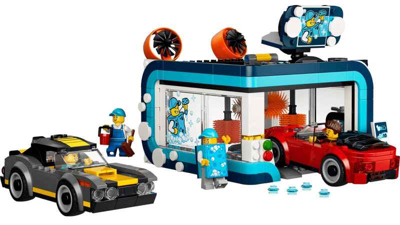 A LEGO building set showing a blue and teal ice wash station with a red car inside, a gray and yellow car outside, and two minifigures on a plain white background.