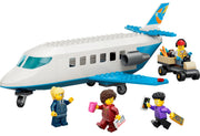 LEGO Passenger Plane set with a white and blue jet, a cargo cart with a driver, and four minifigures on a plain white background.