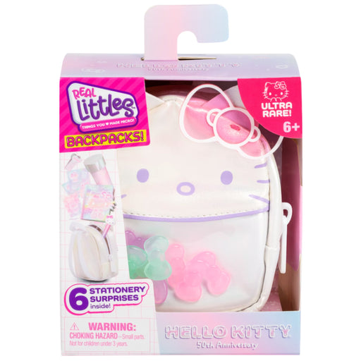 Hello Kitty themed 'Real Littles' stationery surprise backpack in its original retail packaging. The product is a white faux-leather mini backpack clip with a Hello Kitty face, featuring translucent pink bow details and pastel pink, green, and blue flower accents.