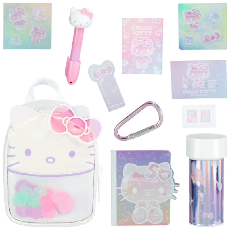Hello Kitty themed stationery and accessory set featuring a clear backpack with a Hello Kitty face and bow, pink pen, sticker sheets, cards, a carabiner, a notebook, and a holographic tumbler.