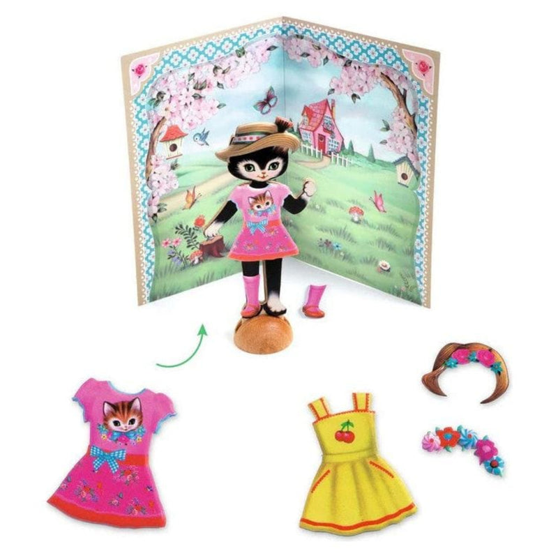 DJECO Little Wardrobe Collage set with cat doll, dresses, accessories, and scenic backdrop