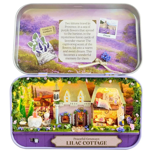 DIY Miniatures Lilac Cottage tin box diorama open showing illuminated lavender cottage scene