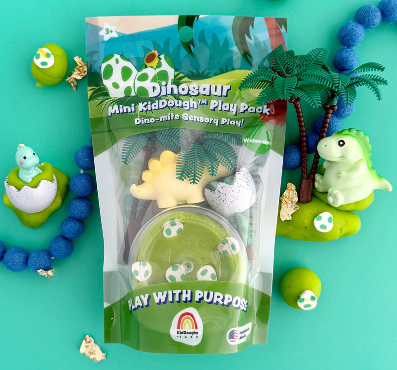 Dinosaur KidDough mini play scene with colorful dough and themed accessories