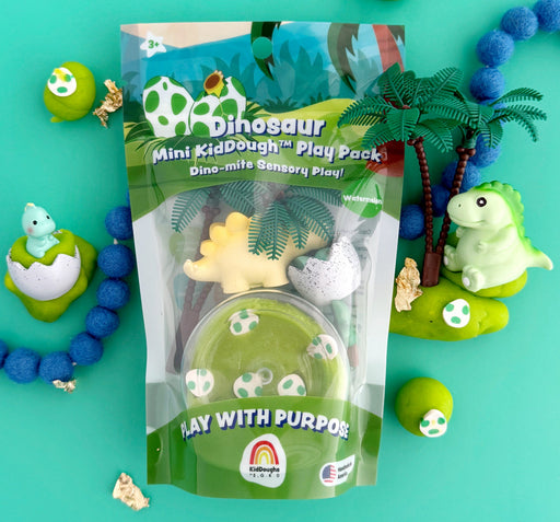 Dinosaur KidDough mini play scene with colorful dough and themed accessories